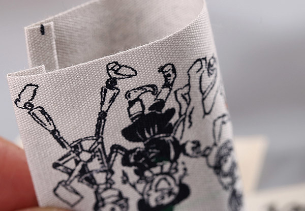 There is a small woven label on the clothes