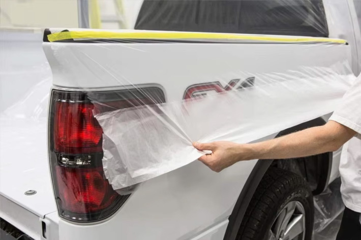 Pre-applied masking film is applied in car beauty care