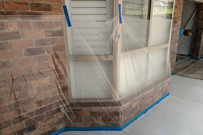 Pre-applied masking film