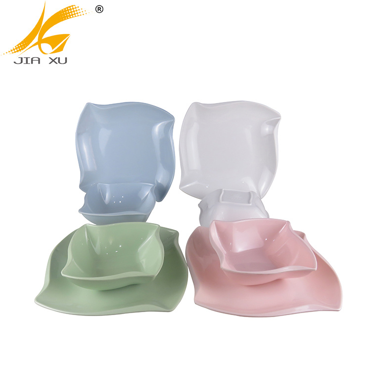 color melamine plates and bowls light blue light green pink and white melamine tableware