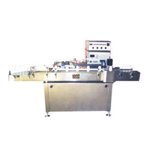 Sealing and labeling linkage machine