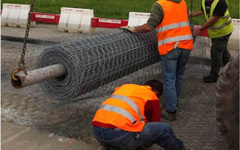 Reinforced road mesh