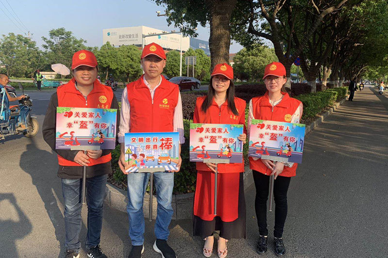 友谊菲诺组织开展“志愿者文明出行劝导”活动