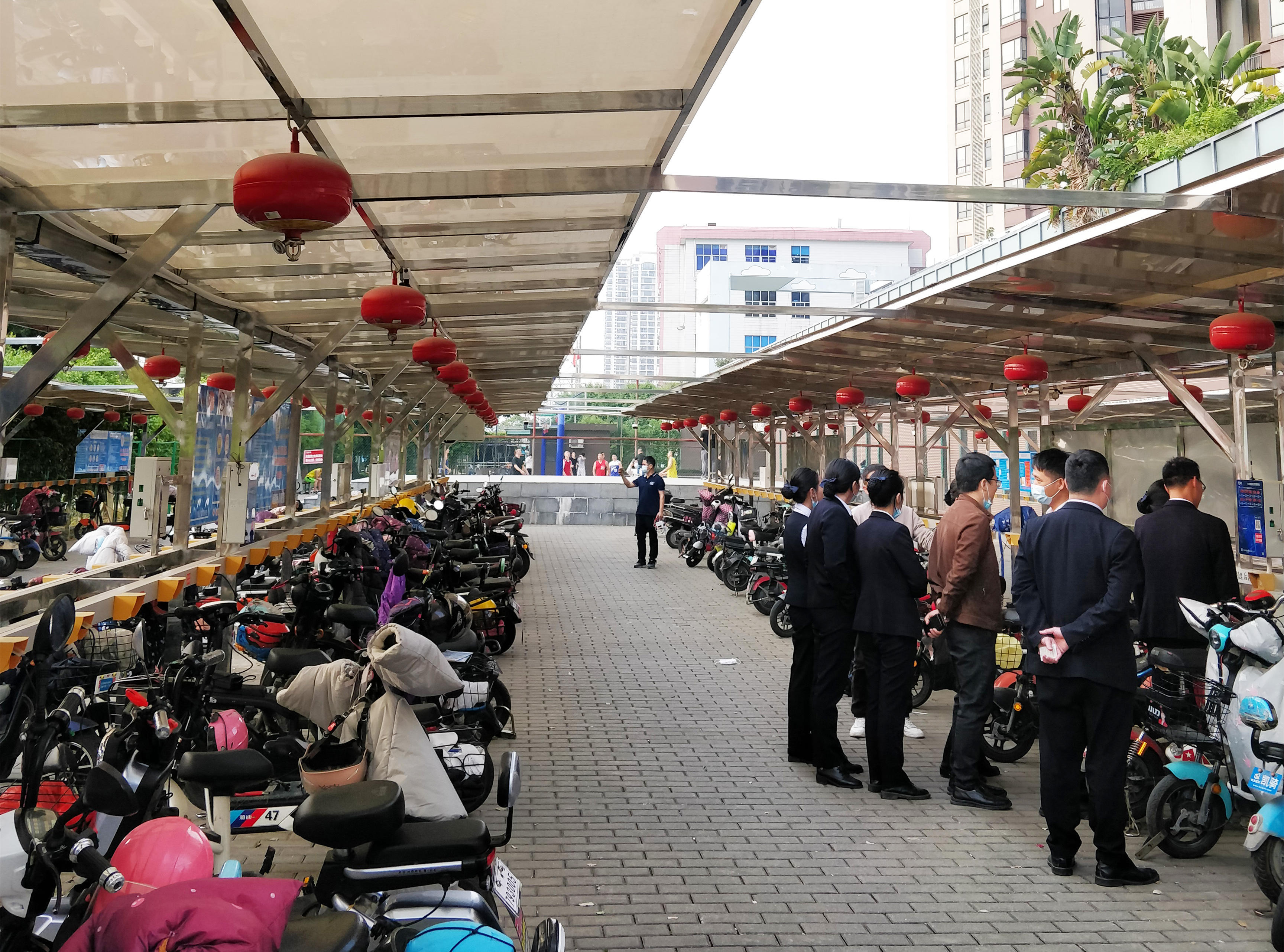 Electric vehicle charging station installation case sharing in commercial residential area