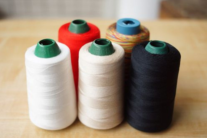 What is the strength and performance of polyester sewing thread?