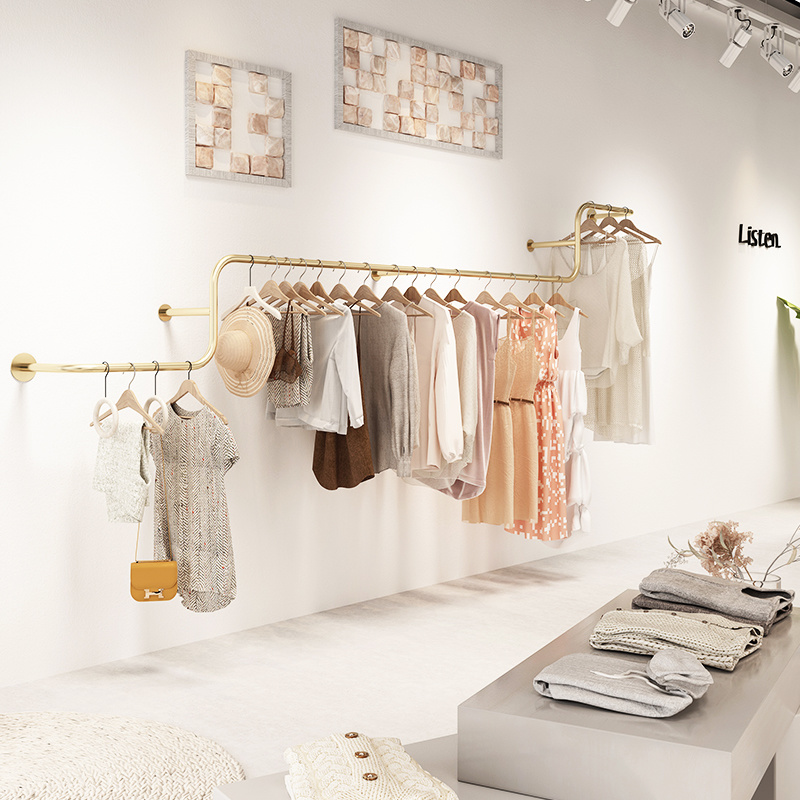 Fine clothes hanging display frame customization womens gold steel display clothing rack for shop