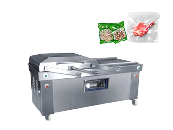 Double-chamber vacuum packaging machine