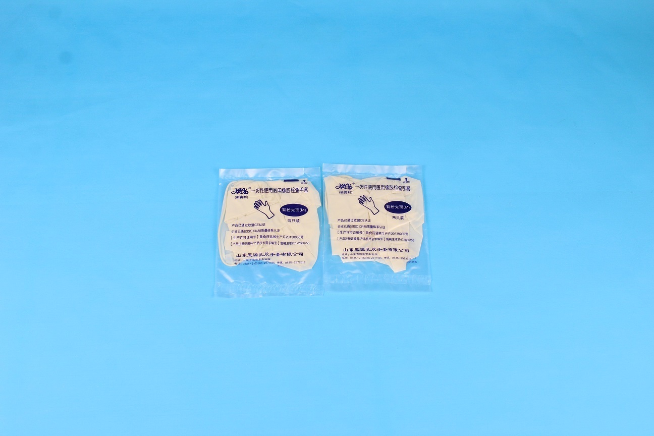Powdered medical rubber examination gloves (sterilized in 2 packs)