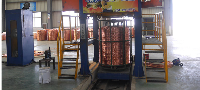Dead block coiler system for copper wire drawing machine