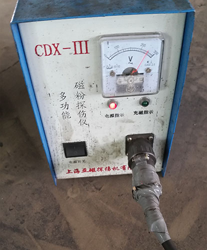 Magnetic powder flaw detector