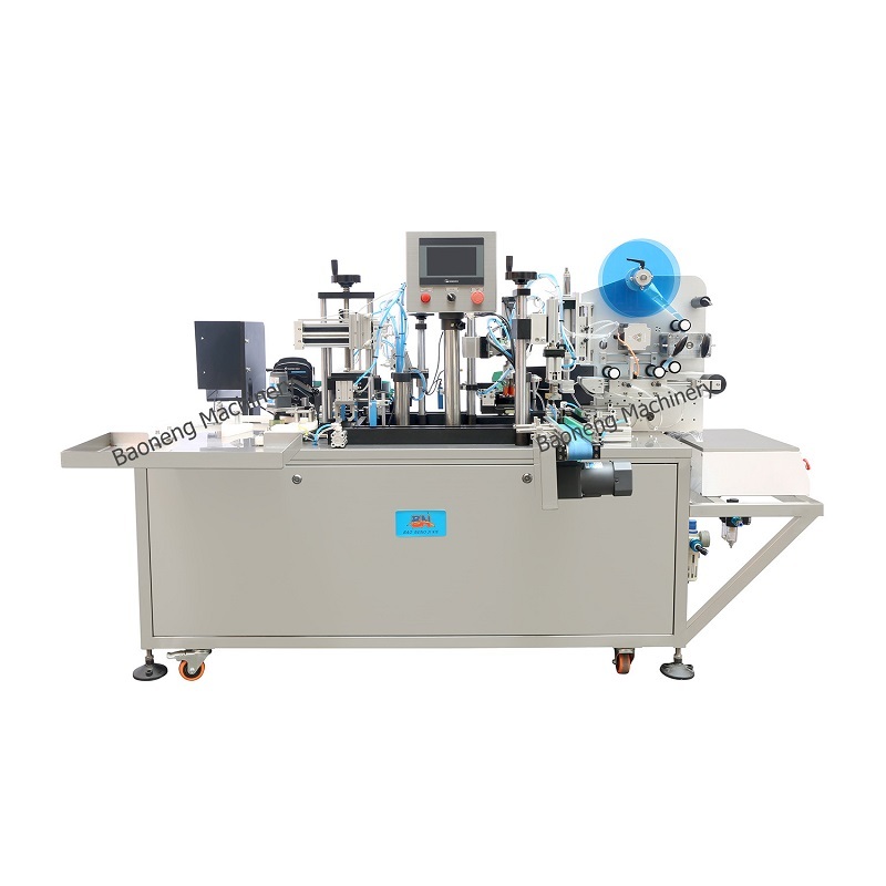 Fully automatic nail polish filler with brush/plug feeding and capping labeling