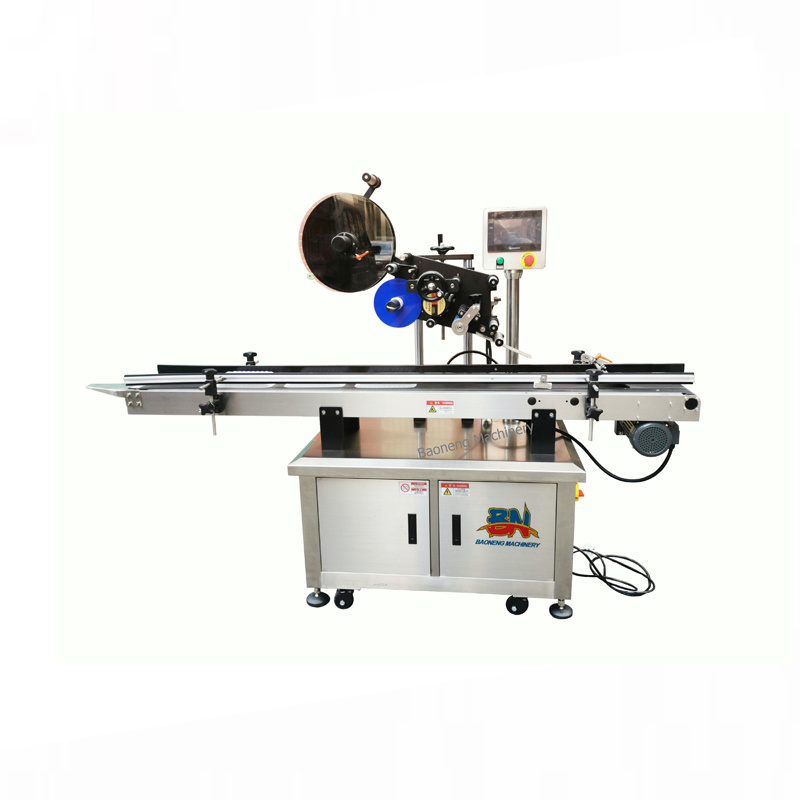 Automatic upper plane labeling machine for lat surface objects