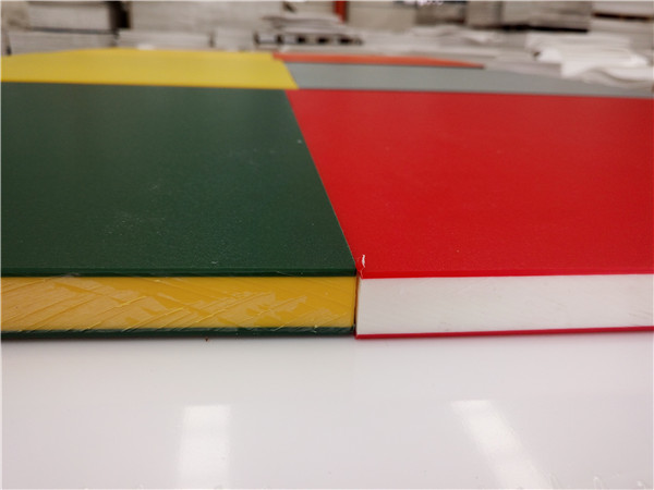 Three layer two color surface textured HDPE board