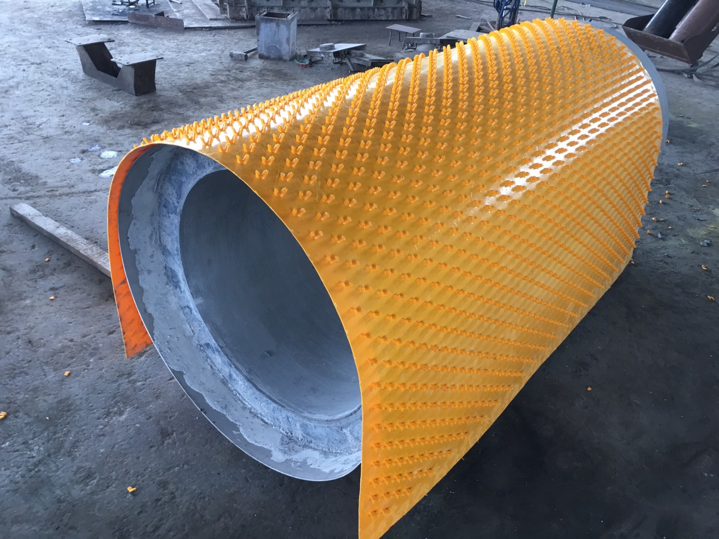 Extruded HDPE Concrete protection liner with multi-point V-lock anchoring studs for concrete protection