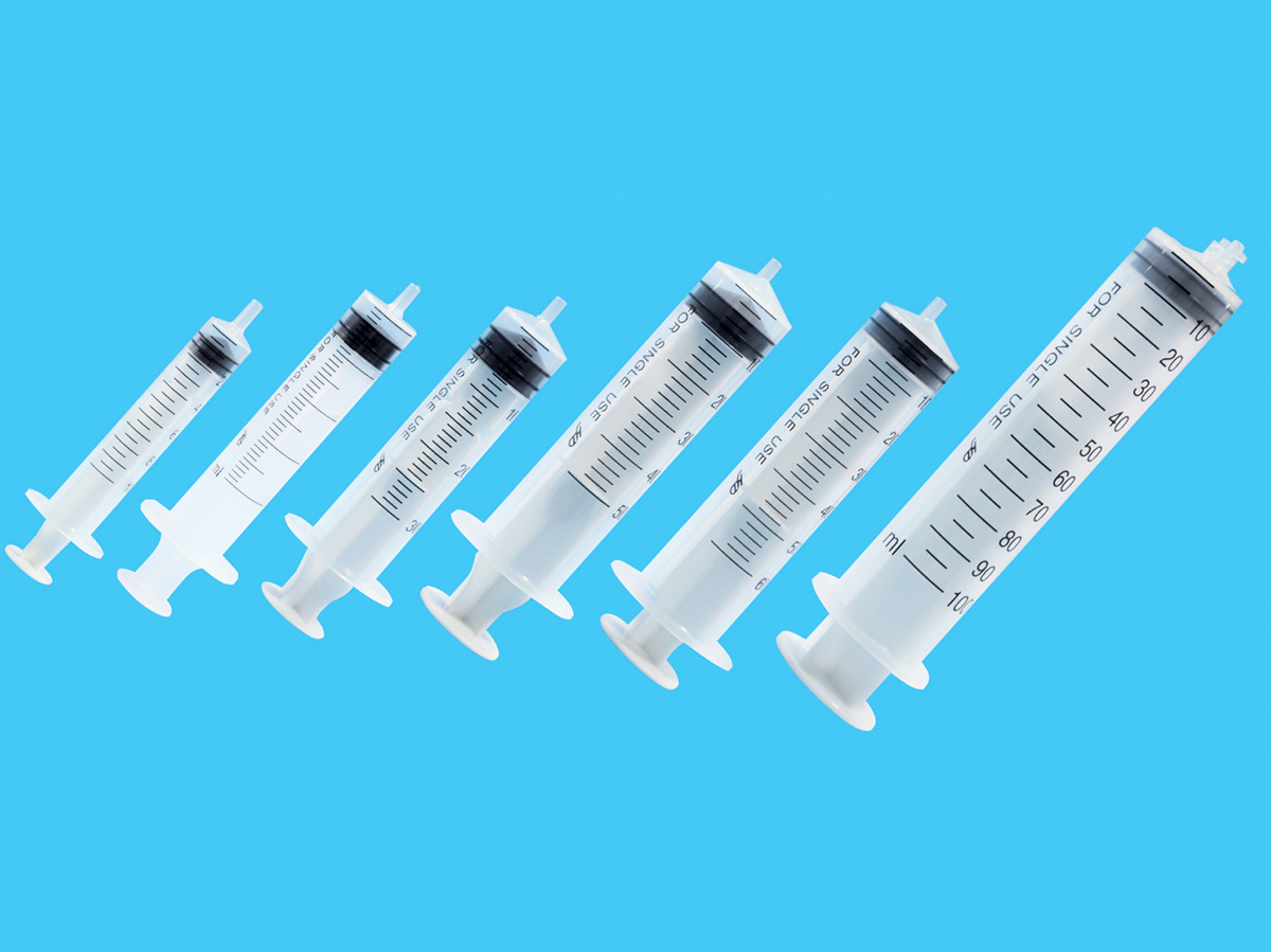 Disposable syringe with needle