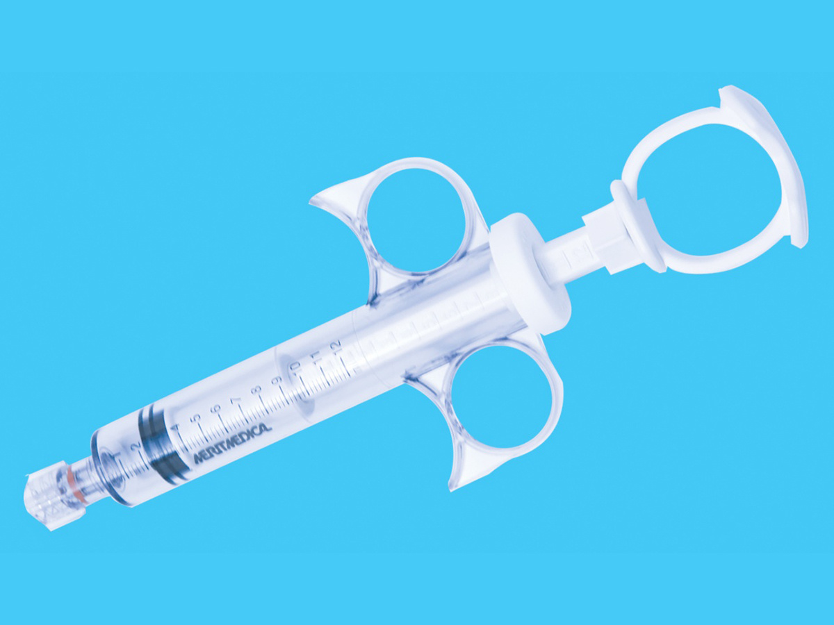Disposable coronary angiography syringe