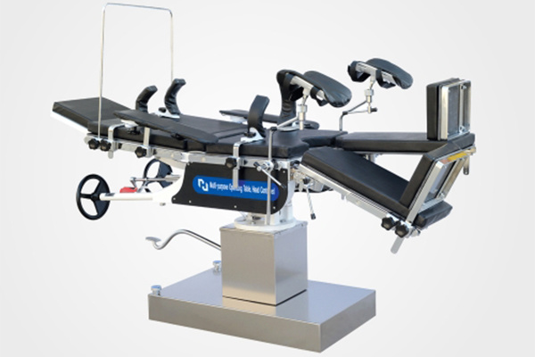 Head-operated integrated operating table