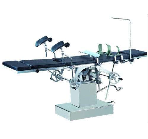 Side-operated integrated operating table
