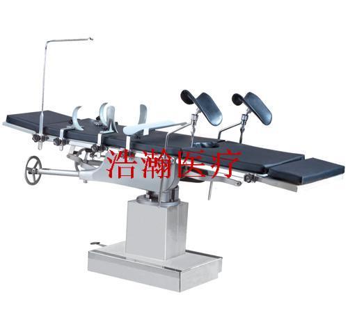 Head manipulation integrated operating table