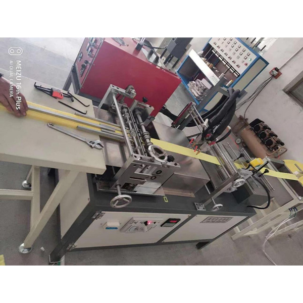OIL FILTER FOLDING MACHINE