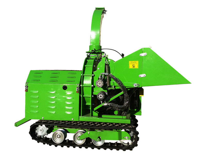 Powered wood chipper