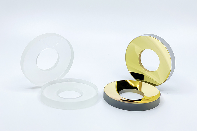 Aspherical mirror with hole