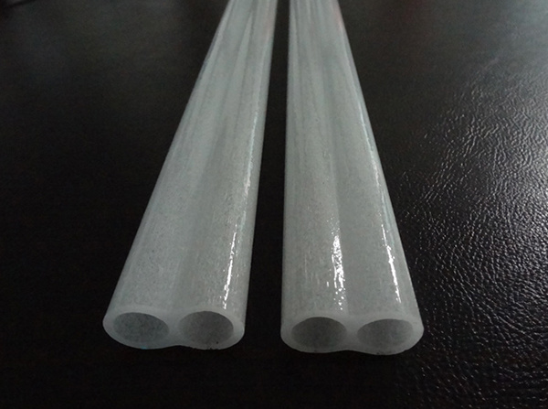 Opalescent double-hole tube