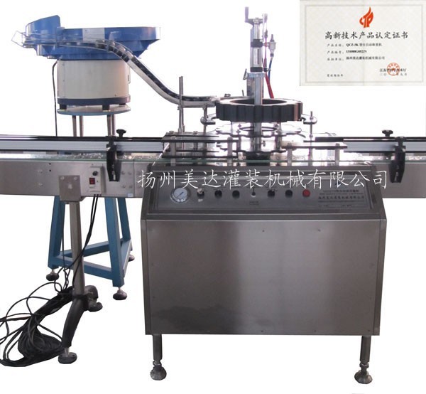 Automatic cap presser