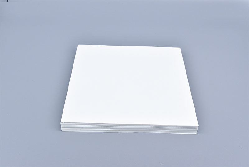 Oil absorbing paper