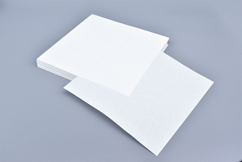 Oil absorbing paper