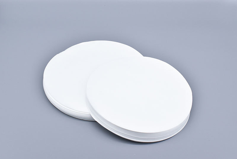 Oil absorbing paper