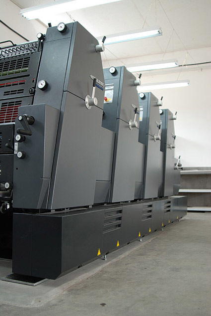 Four-color printing press