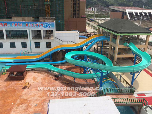 Tianyue Water Park is located in Chuandong Education Park, Bijiang District, Tongren City, with the theme of the Amazon tropical rainforest, integrating amphibious amusement experience.  Water amusement facilities include thrilling loudspeakers, space basins, speed slides, spiral slides, children’s favorite happy villages, lazy rivers, as well as wave pools and rainbow slides that are popular with people. There are also many Tongren special snacks for the grounding gas park; coupled with the high-quality service concept, it will bring tourists a new experience of water amusement that is safe, mysterious, exciting, leisure, and joyful.