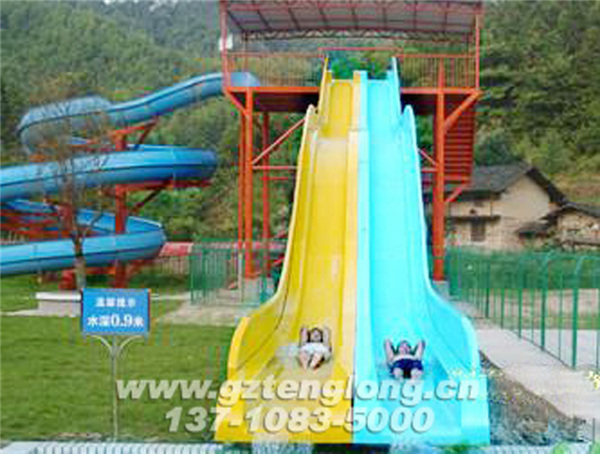 Dawei Mountain Water Park is located in the beautiful "Huxiang Treasure" Liuyang City, Hunan Province. Dawei Mountain is the branch of Luoxiao Mountain Range and the birthplace of Liuyang River. It is the three major tourist destinations around Changsha and an international tourism and leisure center. Dawei Mountain Water Park is located in Longxu Canyon of Dawei Mountain. It was designed and built by Guangzhou Tenglong Water Park Equipment Co., Ltd. It was completed in June 2012 and opened in the summer of the same year. The customer experience is good and the reception capacity is superb. The project mainly includes rainbow slides, fast slides, children's water playing equipment, among them, the first domestic aerial rotating kayak rafting slide.