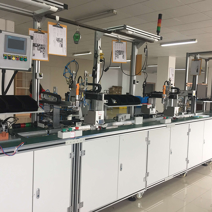 Photographic lamp production line Photographic lamp production line