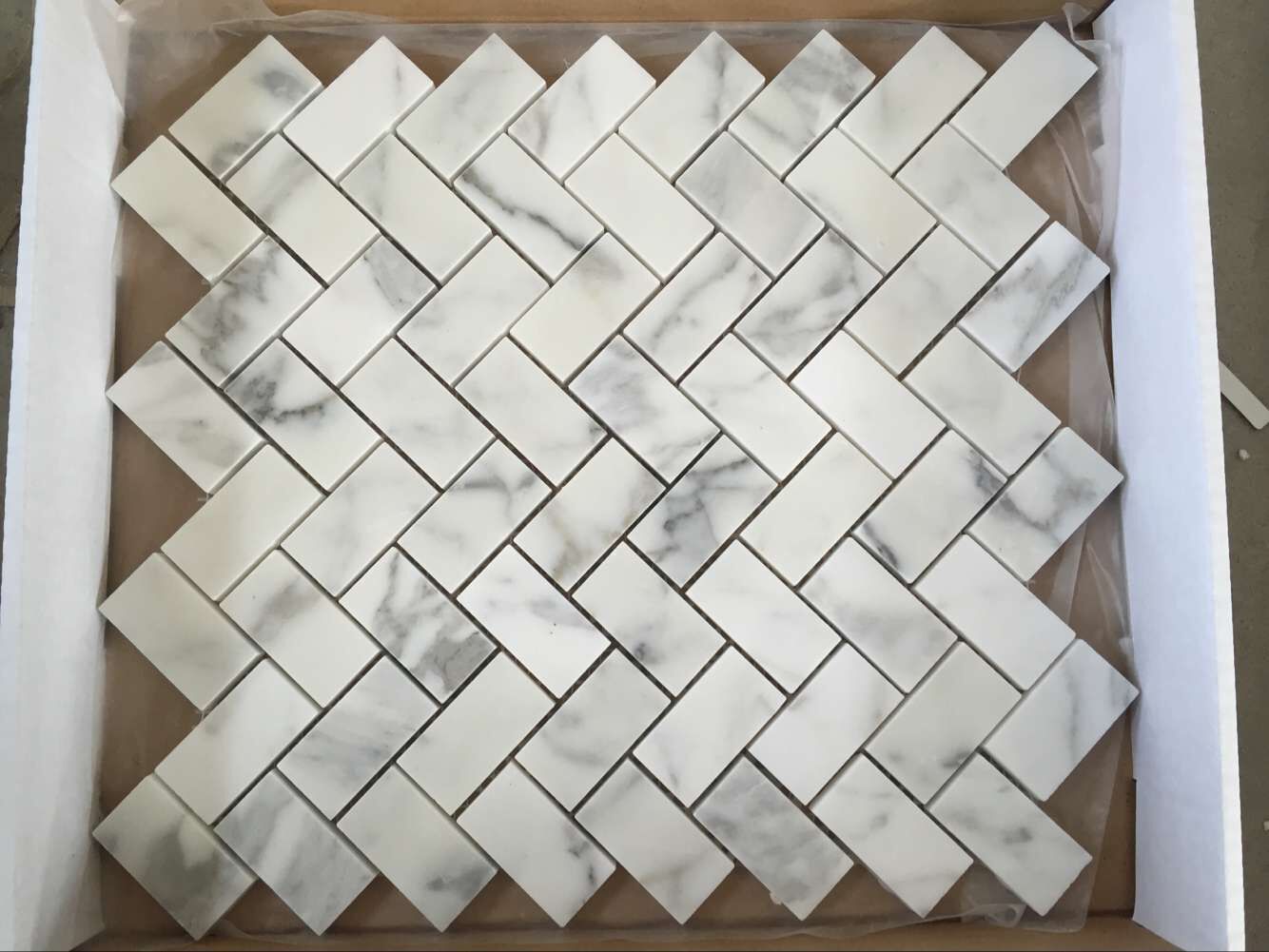 calacatta white herringbone mosaic