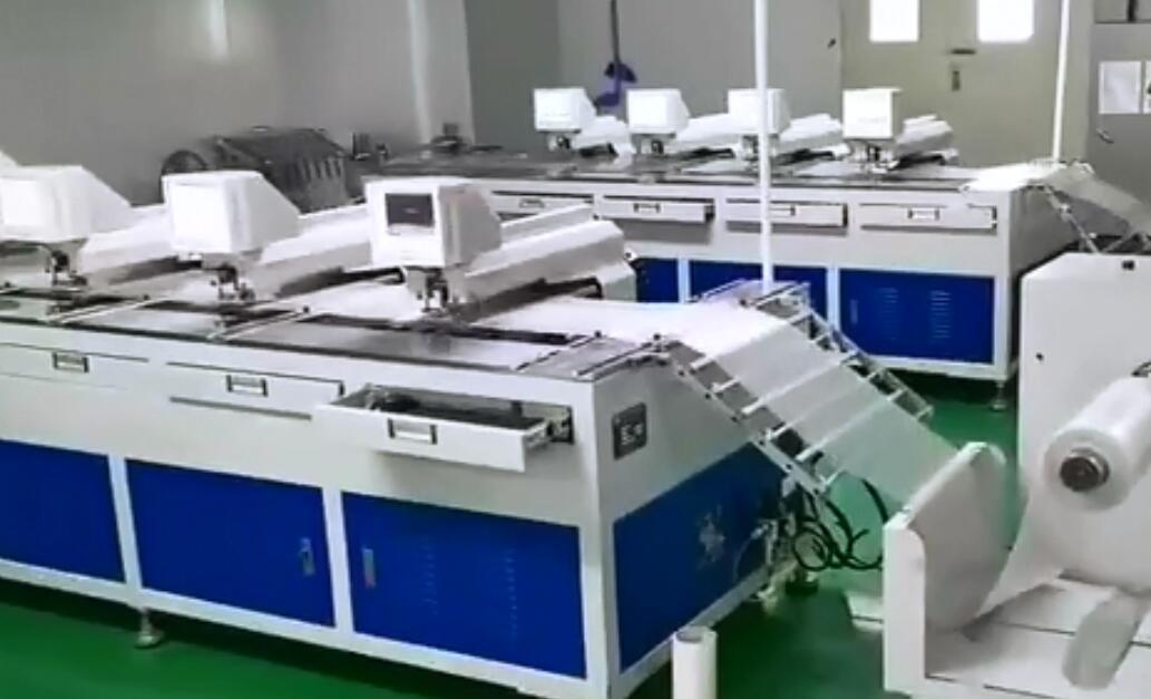 Four-head roll-to-roll punching machine