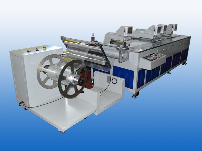 Four-head roll-to-roll punching machine