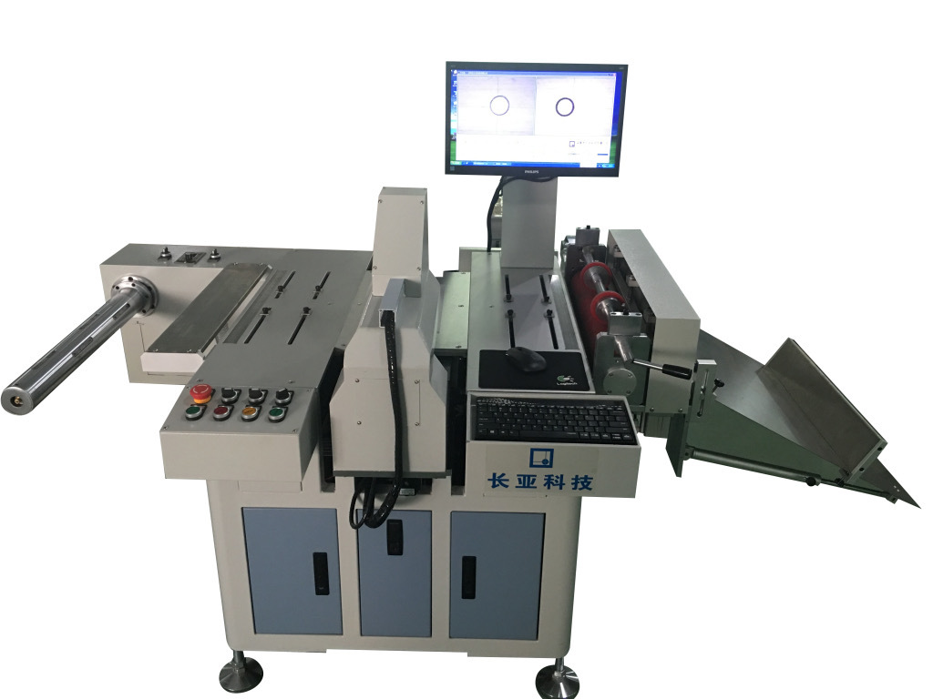 Head-to-roll punching and cutting machine