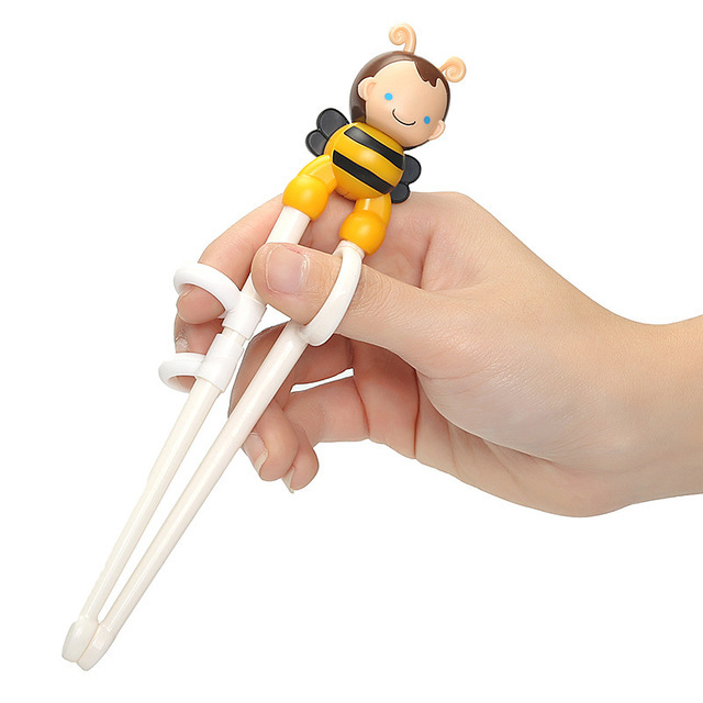 Children Learning Chopsticks