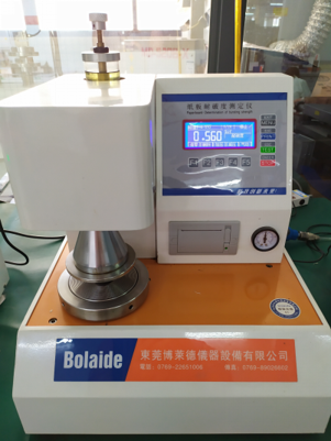 Cardboard bursting strength tester