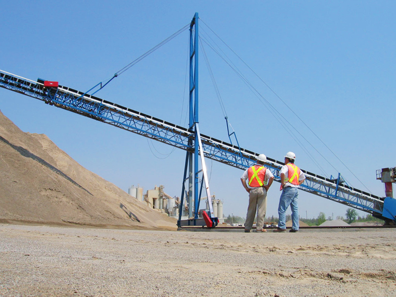 Radial rotary retractable stacker