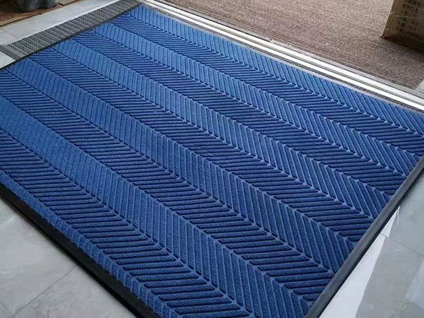 Embossed doormat