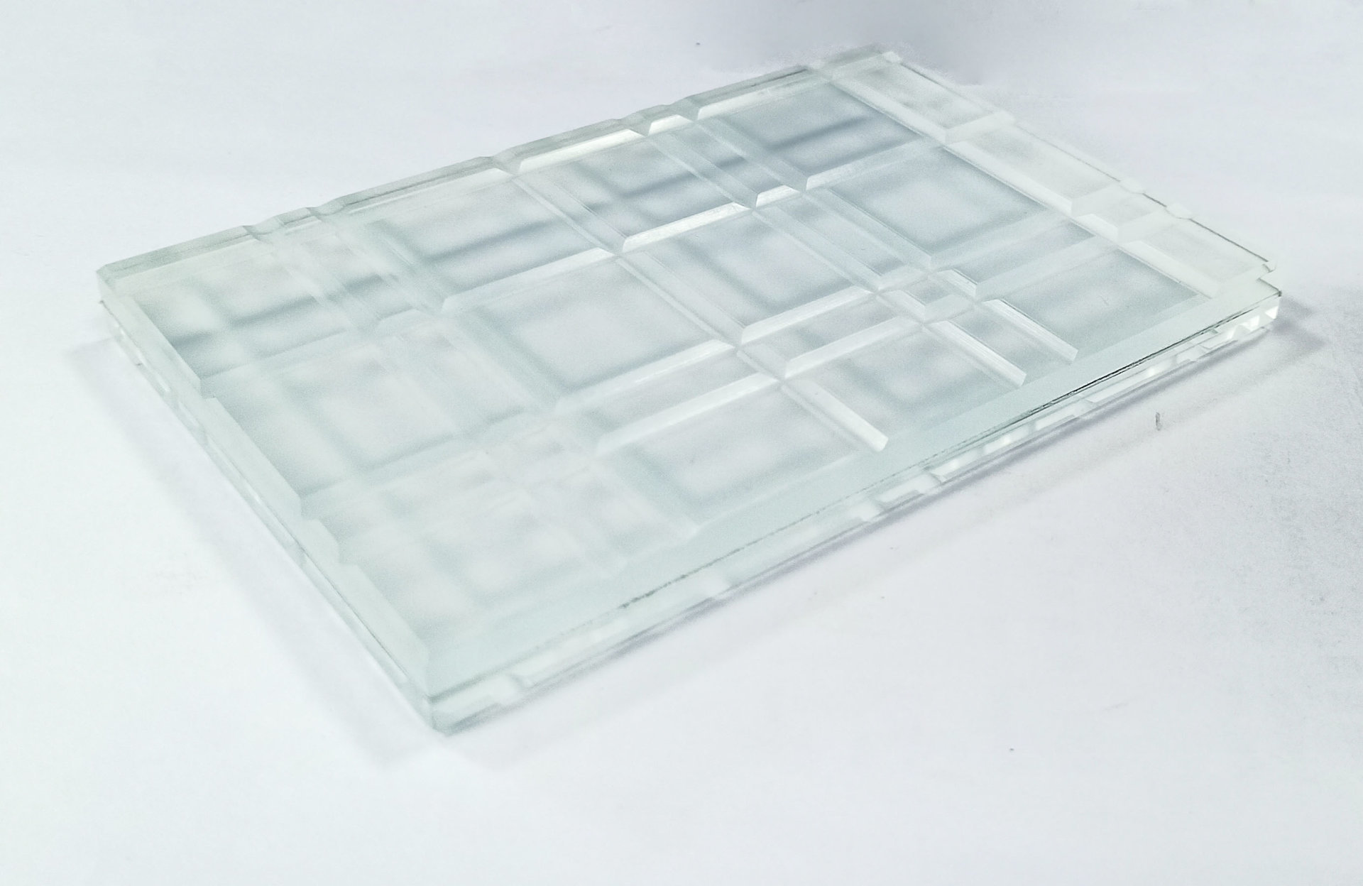 Carved glass    Carved Glass means sandblasting deeper into the surface, creating a three dimensional sculpted image giving greater detail to the glass.  Carved glass is widely used in door and window, wall decoration.