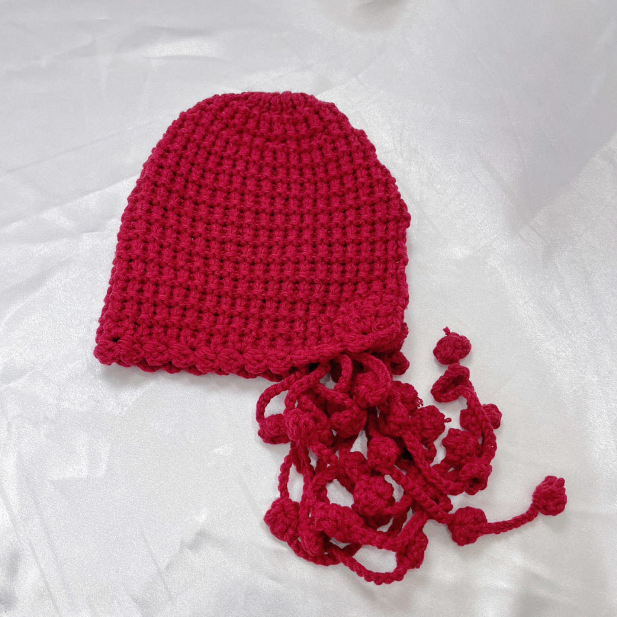 Rear opening knitted cap