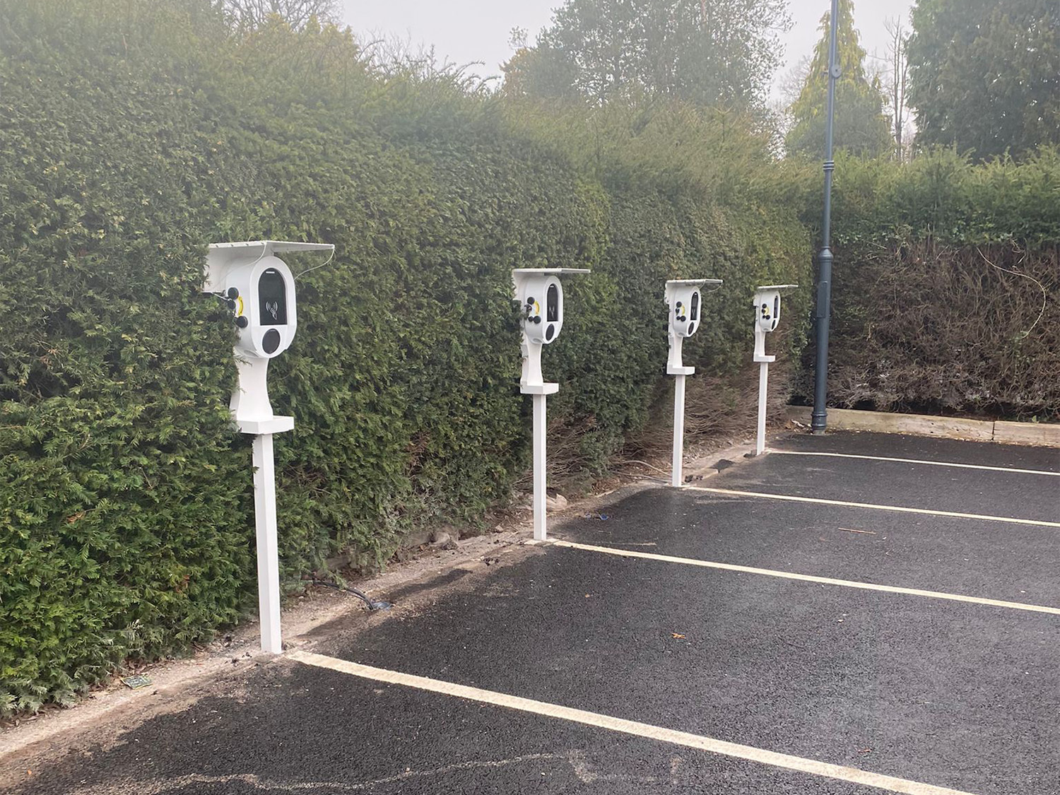 A small household 7/22kW AC EV Charger was successfully installed in a small parking space