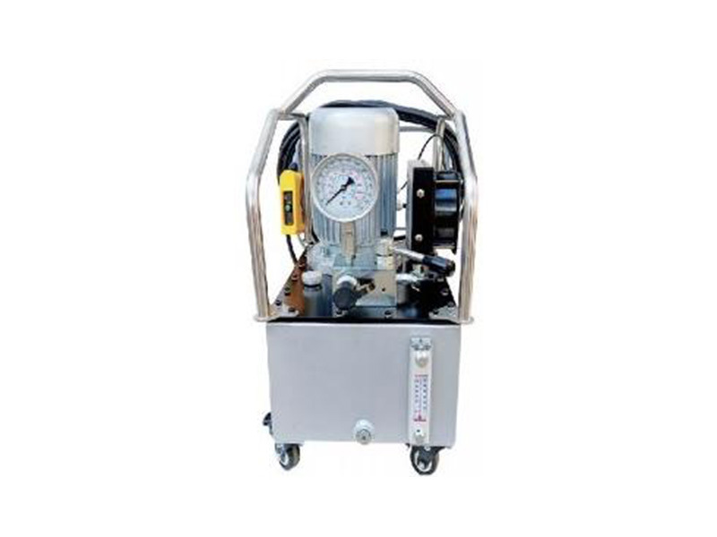 Manual reversing electric hydraulic pump