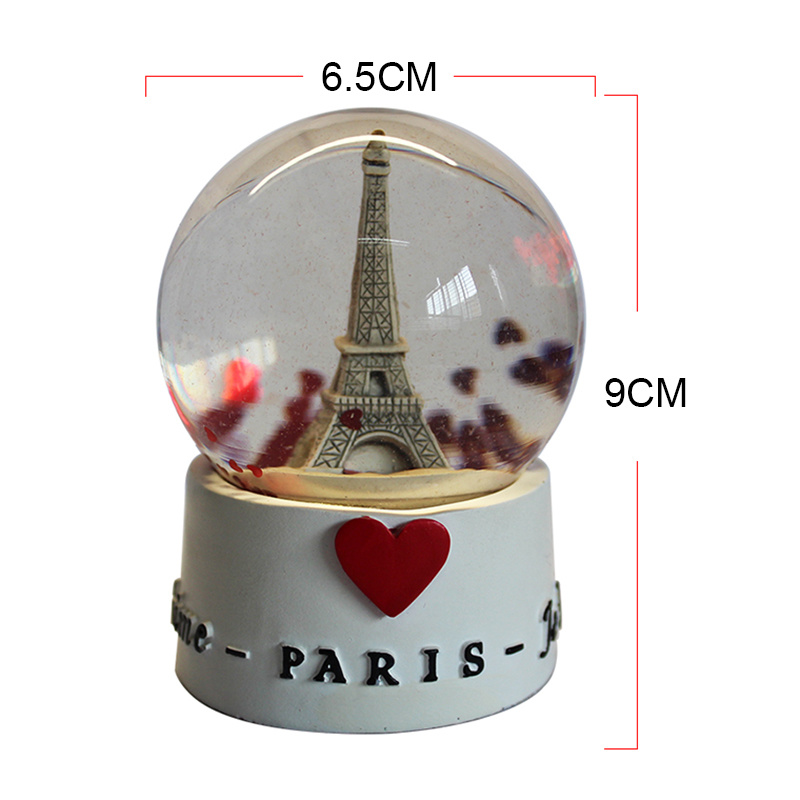 paris eiffel tower snow globe