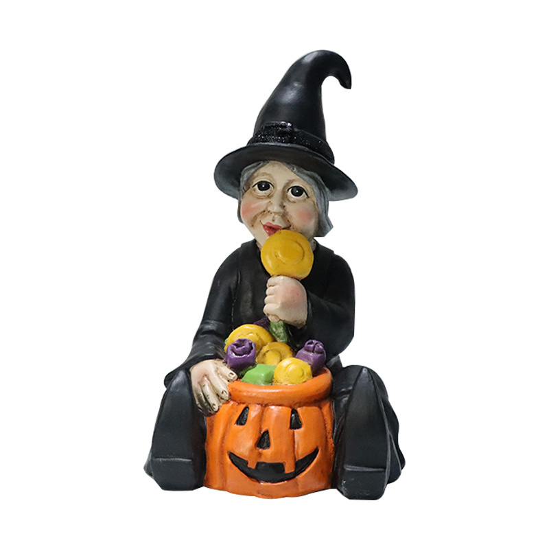 pumpkin witch statue