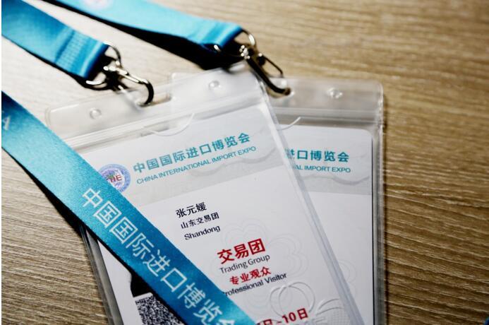 Employees of Shandong Xinhe Paper Engineering Co., Ltd. observe the China International Import Expo